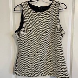 Cream and black colored blouse